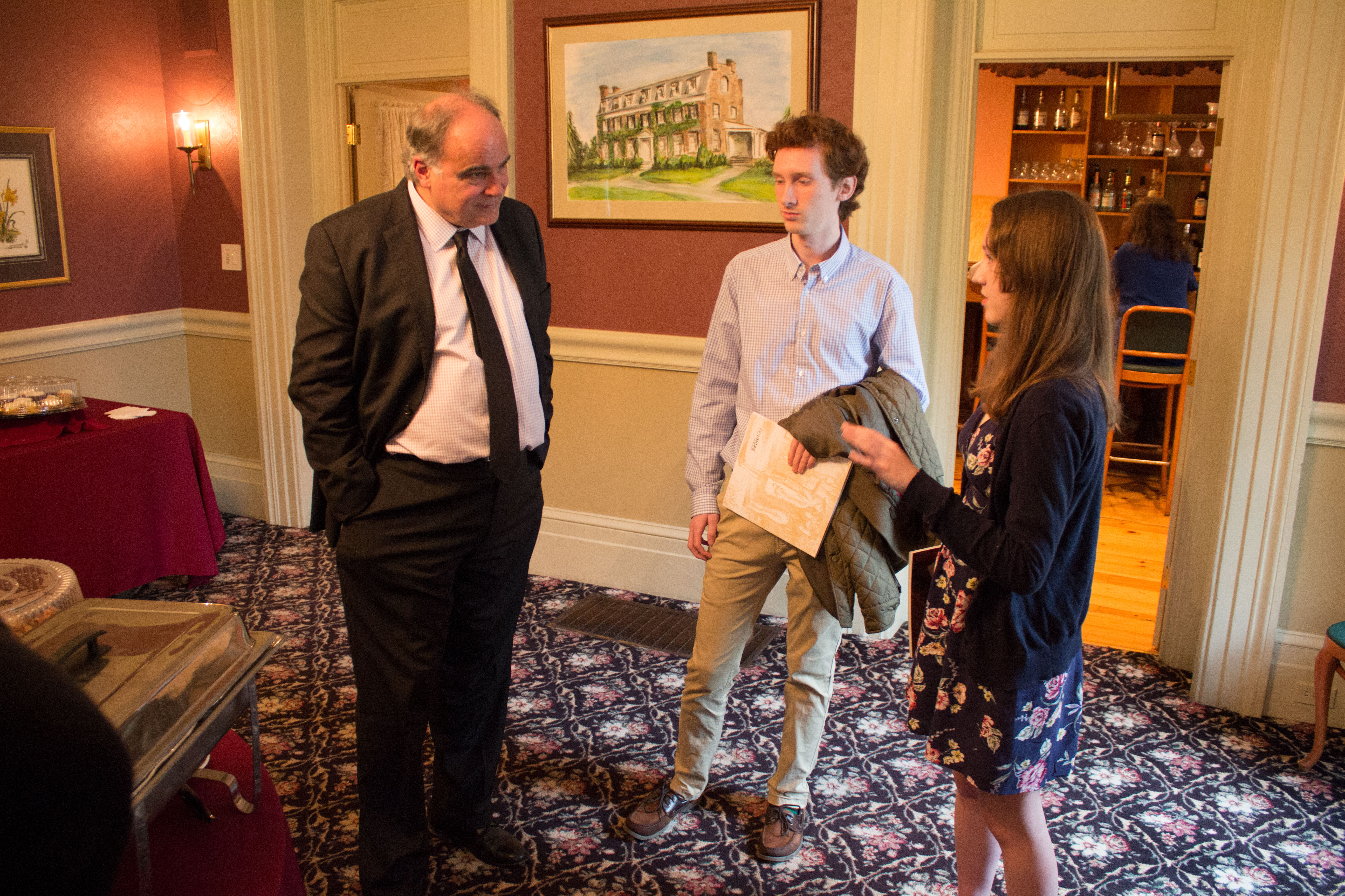 AHI President Robert Paquette with Cas Zablotski and Canisius student Charlotte Kacprowicz